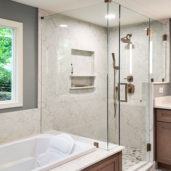Bathroom | Spa-inspired bathroom remodel with tile shower and white vanity in Santa Rosa FL