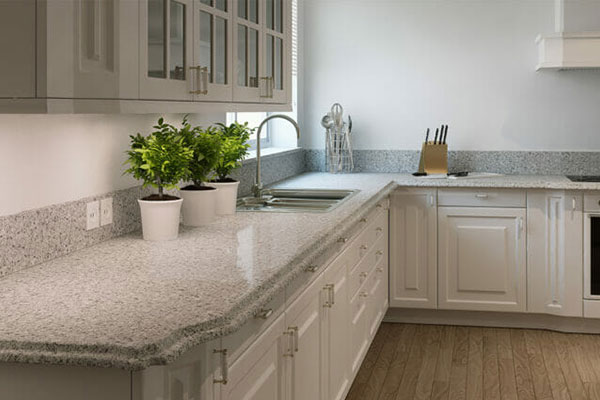 Modern kitchen with Caesarstone quartz countertop in Cloudburst Concrete finish